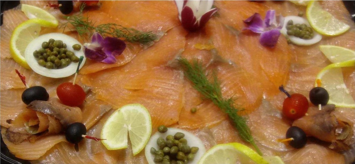 Kosher smoked salmon board with capers and lemon by Jerusalem Catering NJ